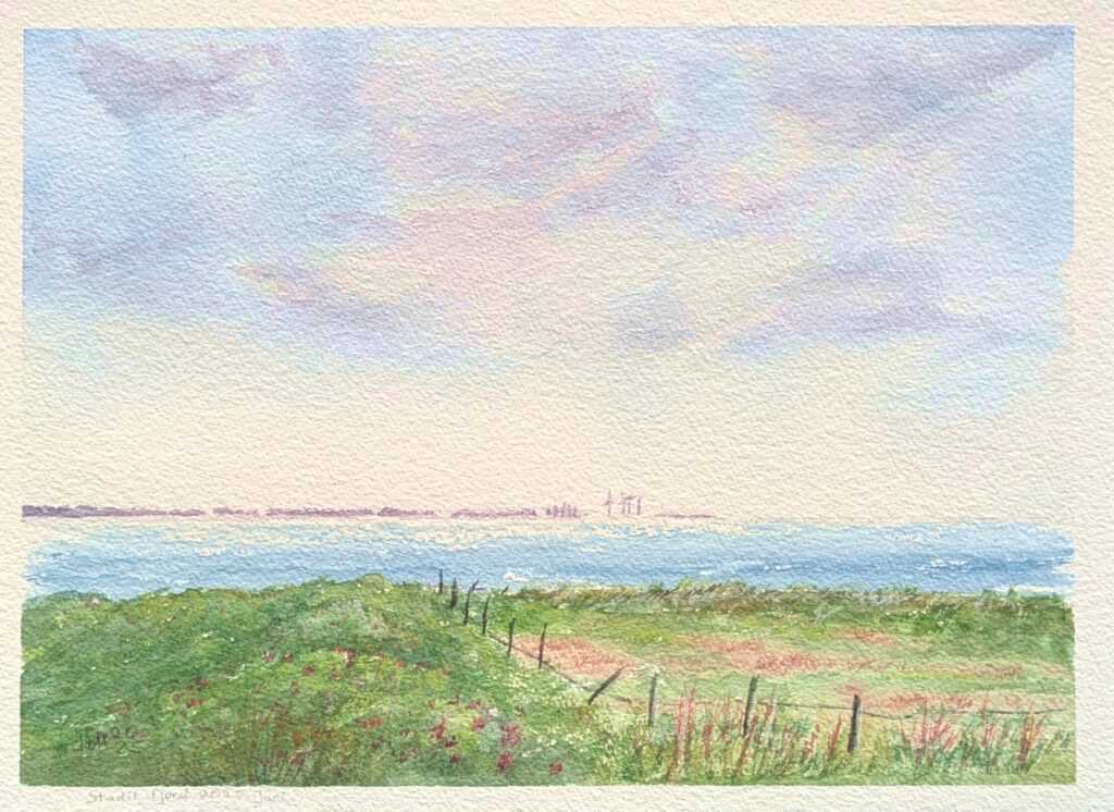 Ein Aquarellbild in einem Rahmen aus heller Eiche.